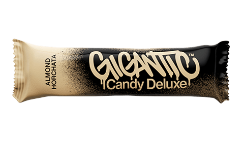 Gigantic Candy Deluxe Almond Horchata bar in tan and black wrapper