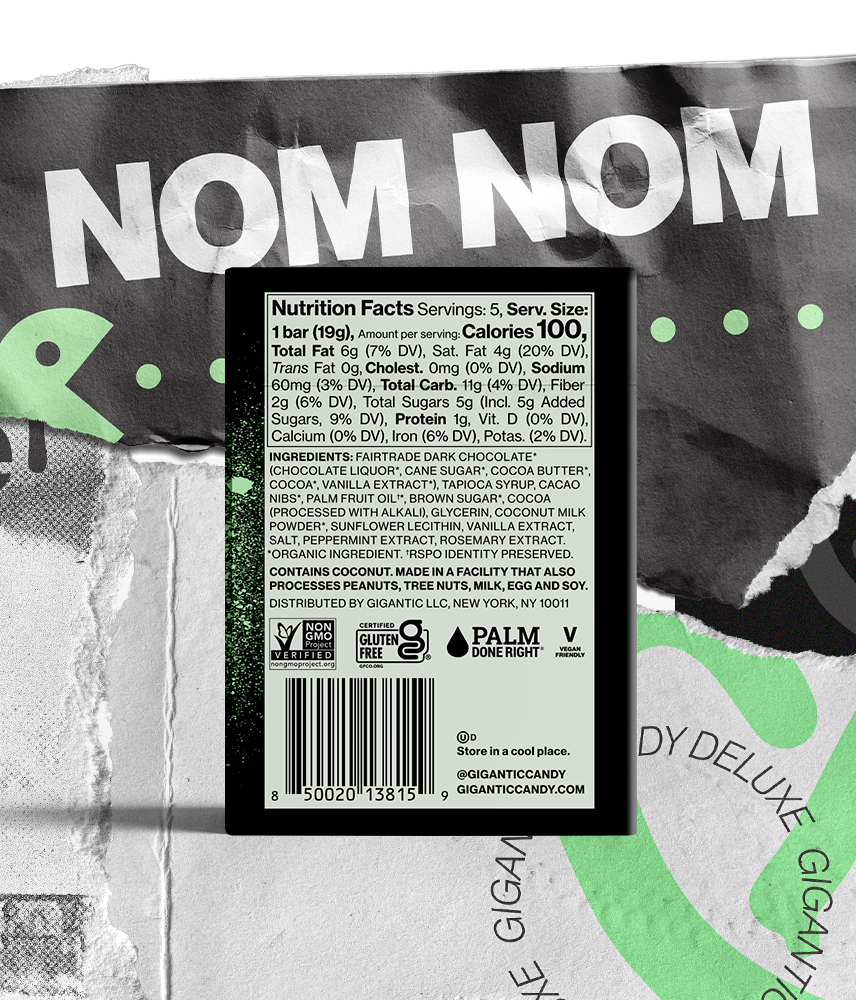 Back packaging showing Nutrition Facts panel, ingredients list, barcode and 'NOM NOM' branding on torn paper background.