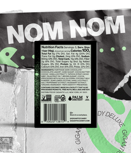 Back packaging showing Nutrition Facts panel, ingredients list, barcode and 'NOM NOM' branding on torn paper background.