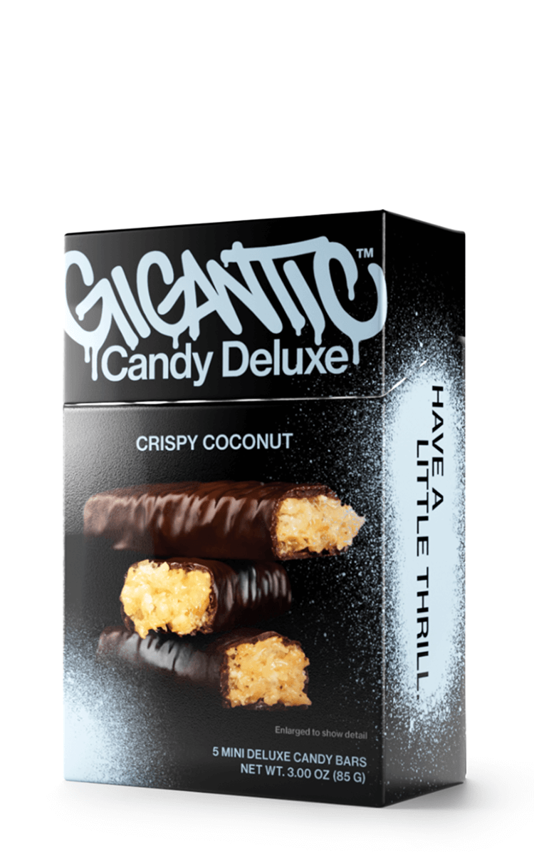 Gigantic Candy Deluxe Crispy Coconut carton packaging with blue and black design.